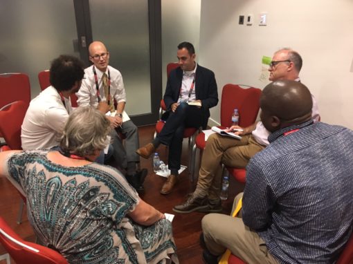 Group sitting down and talking
